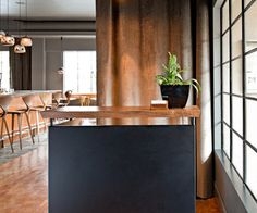 Modern Restaurant Hostess Stand with Natural Elements