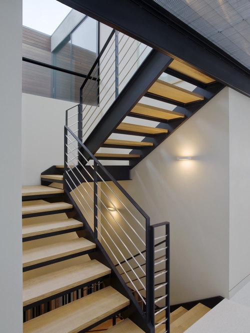 Modern Stairwell with Sleek Wall Sconces