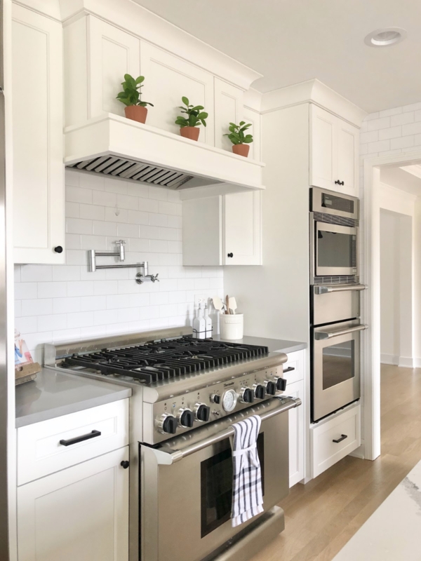 Modern White Farmhouse Kitchen with Range Hood