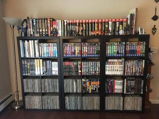 Organized Comic Book Collection in Modern Shelving