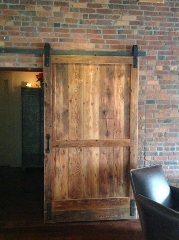 Reclaimed Wood Barn Door with Industrial Hardware