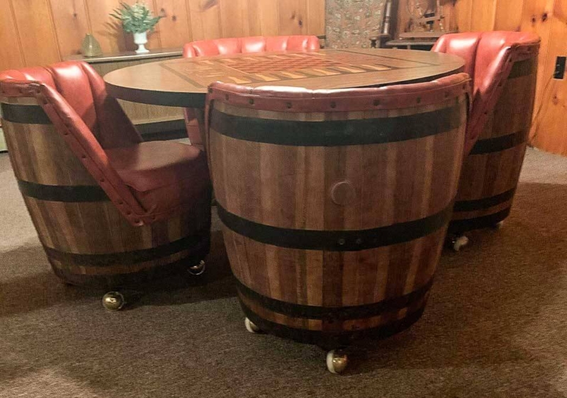 Rustic Whiskey Barrel Table with Leather Chairs