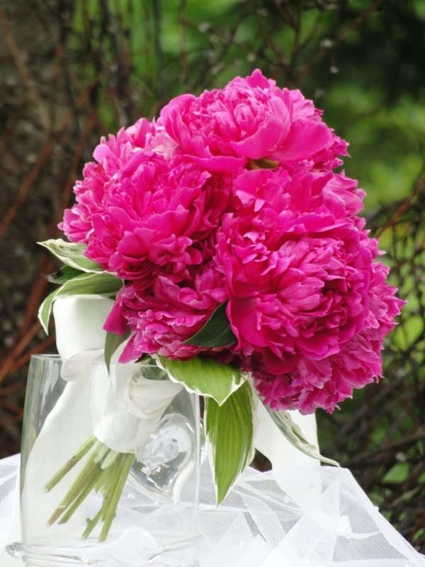 Vibrant Pink Peony Wedding Bouquet with Green Leaves