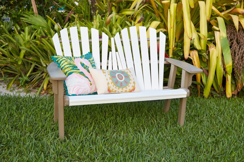 White Coastal Bench with Colorful Accent Pillows