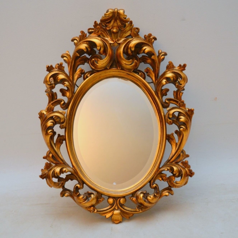Antique Carved Gilt Wood Oval Mirror