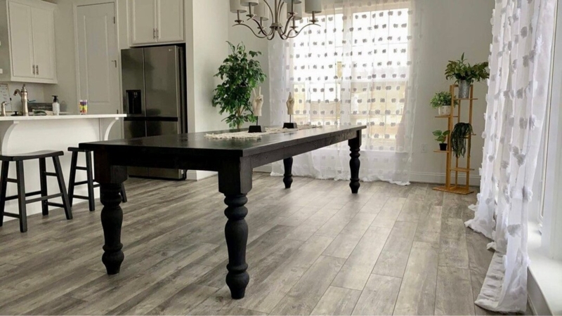 Black Farmhouse Table in Bright Contemporary Kitchen