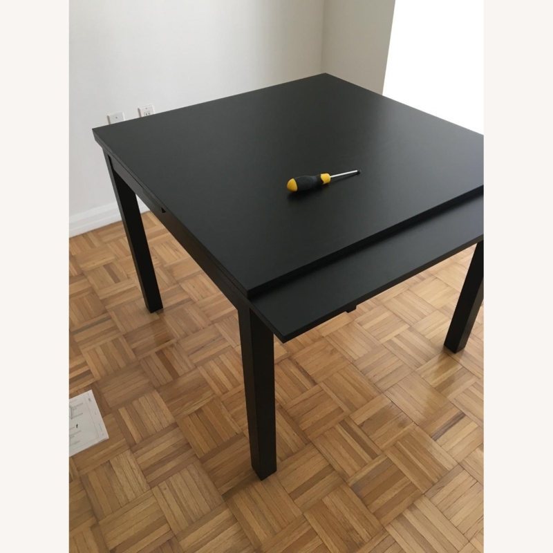 Black IKEA Extendable Pull-Out Dining Table