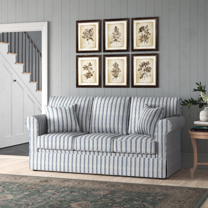 Blue and White Striped Sleeper Sofa in Cozy Living Room