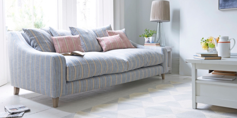 Blue and White Striped Sofa Bed in Bright Living Room