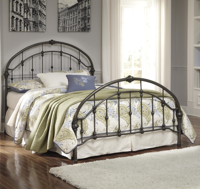 Classic Black Arched Metal Bed with Floral Bedding