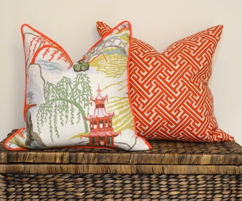 Coral Chinoiserie Pagoda Cushions on Woven Basket