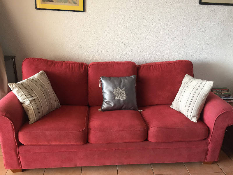 Coral Fabric Sofa with Decorative Cushions