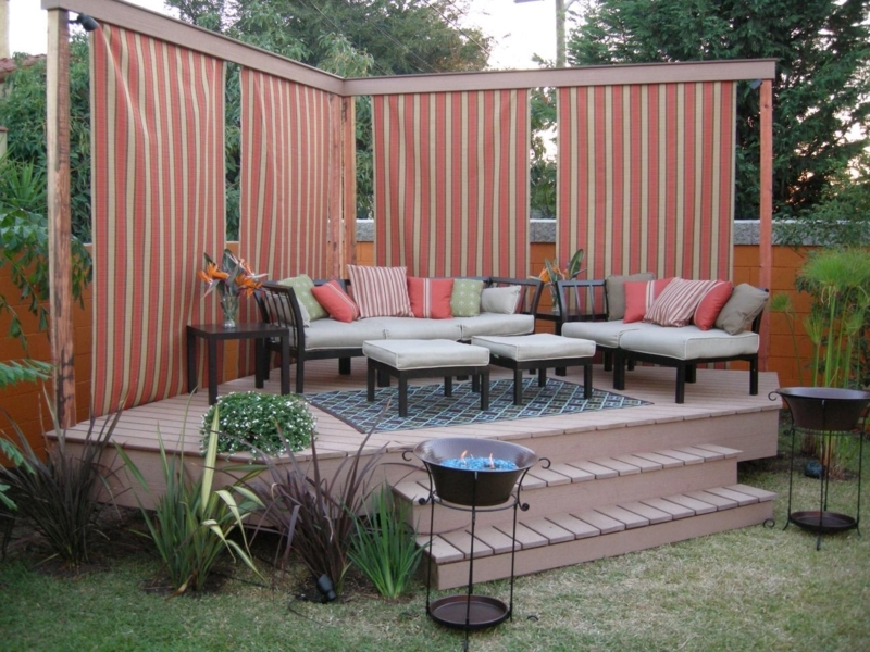 Cozy Outdoor Floating Deck with Privacy Screens