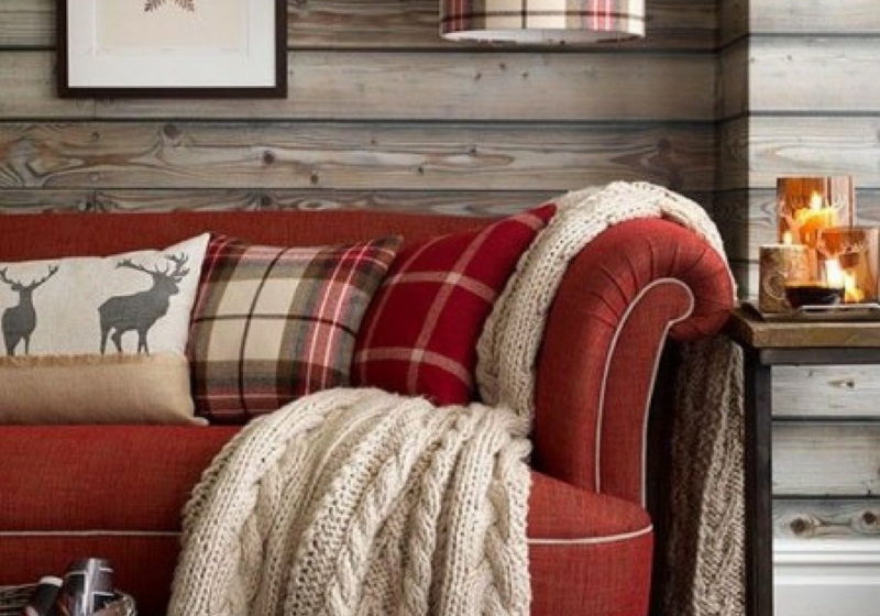 Cozy Red Couch with Cozy Knit Throws and Plaid Pillows