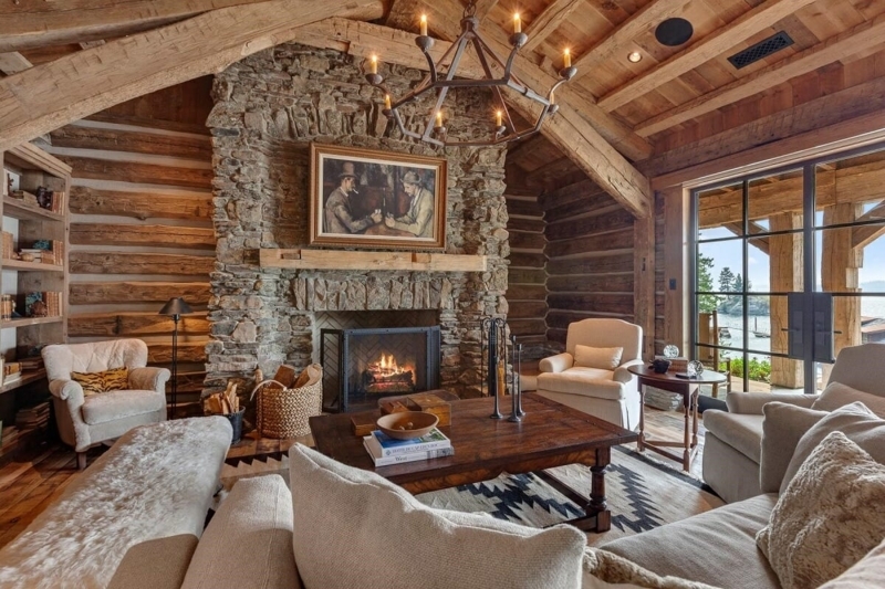 Cozy Rustic Log Cabin Living Room with Stone Fireplace