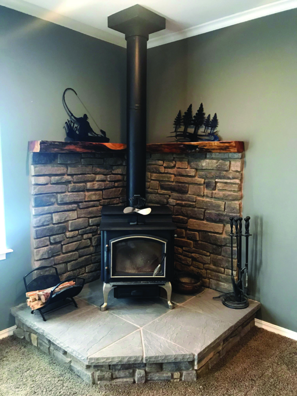 Cozy Rustic Stone and Wood Corner Fireplace Mantel