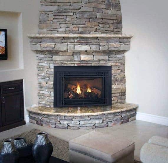 Cozy Rustic Stone Corner Fireplace Design