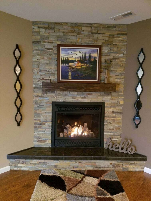 Cozy Stone Corner Fireplace with Rustic Wooden Mantel