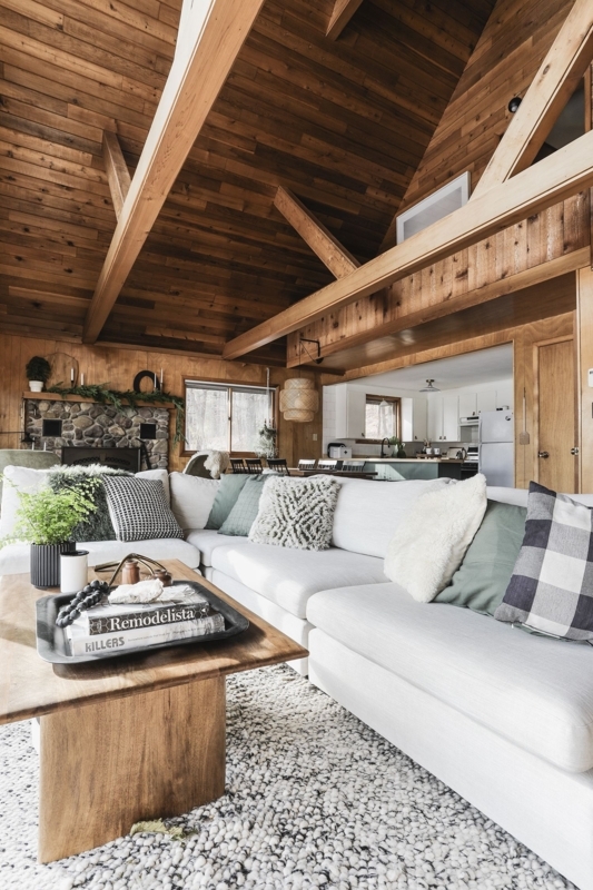 Cozy White Sofa in Rustic Cabin Living Room