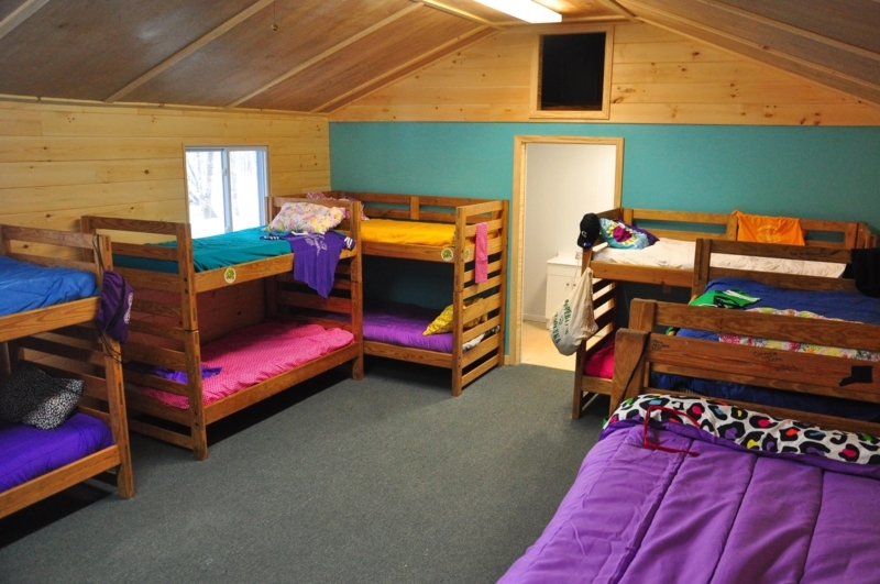 Cozy Wooden Bunk Beds for Summer Camp Cabin