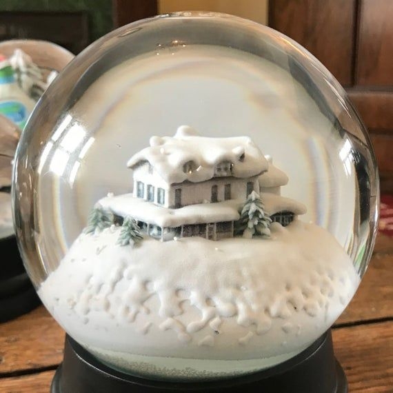 Custom Snow Globe Featuring Cozy Winter Home