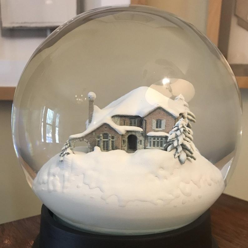 Custom Snow Globe Featuring Cozy Winter Home