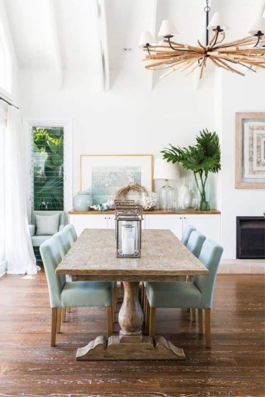Elegant Coastal Dining Room with Light Blue Chairs