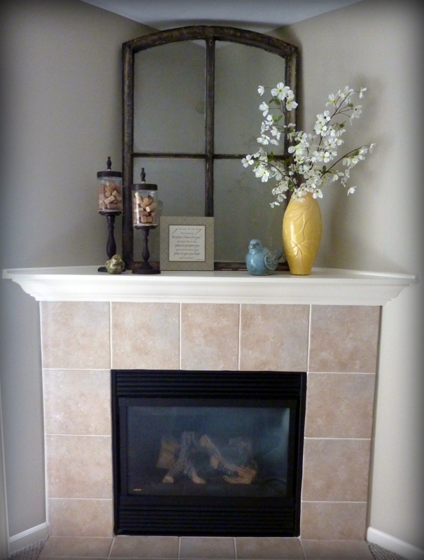 Elegant Corner Fireplace Mantel with Decorative Accents