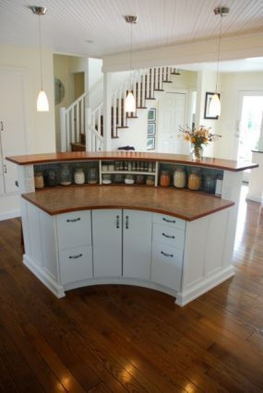 Elegant Curved Home Bar with Wooden Countertop