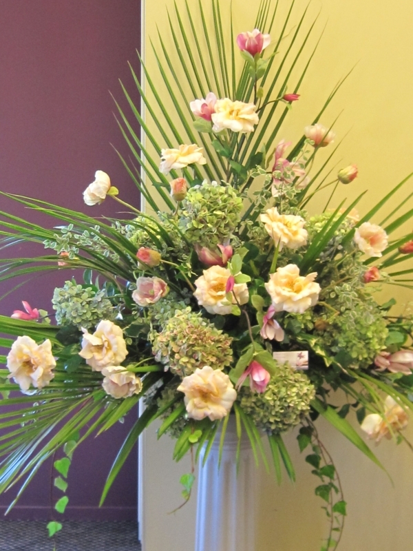 Elegant Floral Arrangement on Classic Pedestal