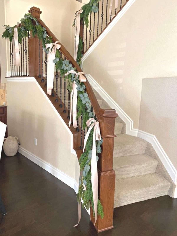 Elegant Garland Decoration on Wooden Staircase