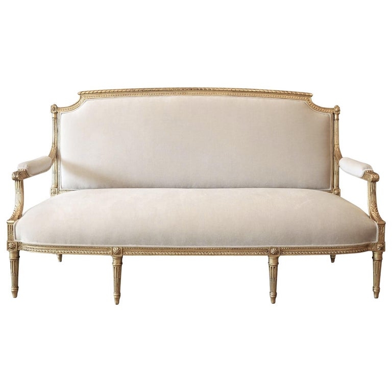Elegant Gilded French Settee With Ivory Upholstery