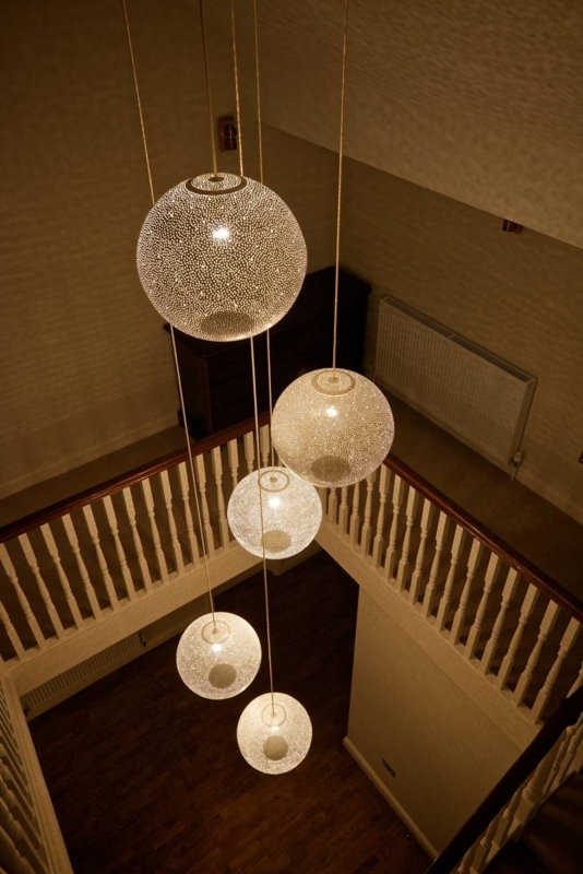 Elegant Spherical Pendant Lights for Stairwell