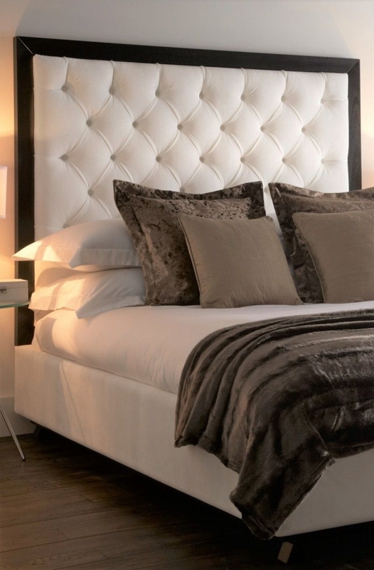 Elegant Tufted White Headboard with Plush Bedding