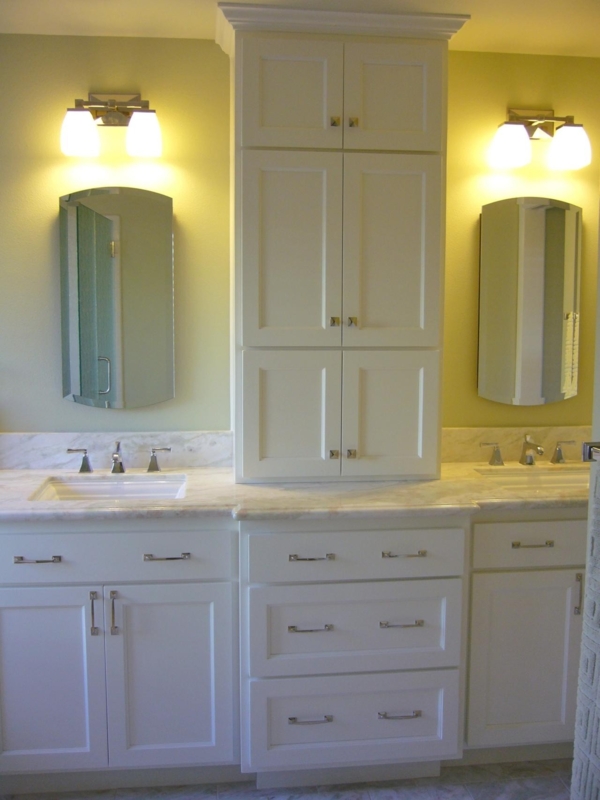 Elegant White Bathroom Vanities with Central Storage Tower