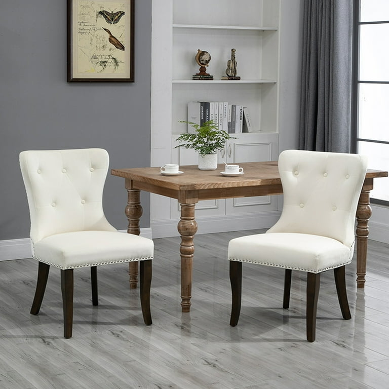 Elegant White Upholstered Dining Chairs with Dark Legs