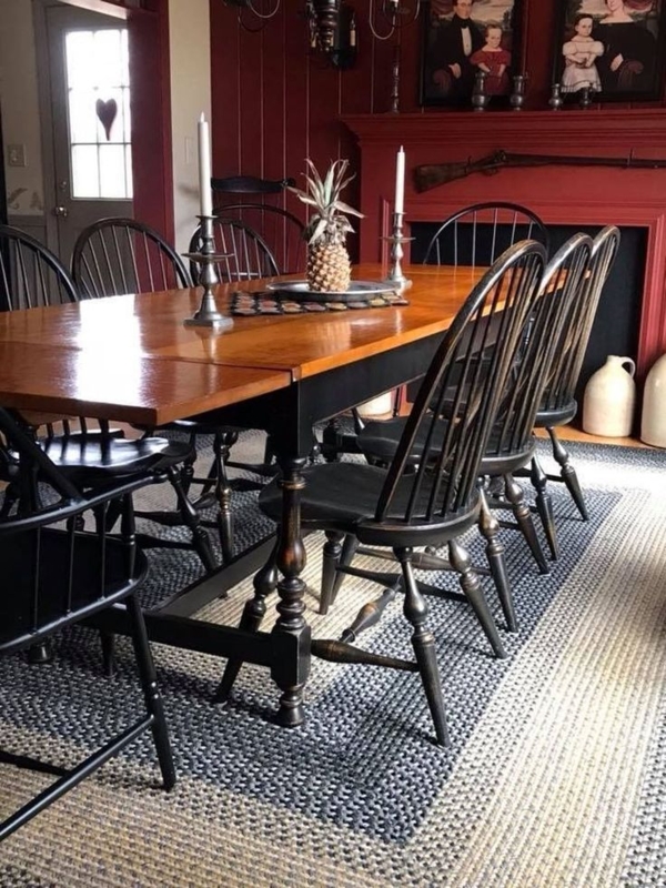 Farmhouse Dining Room with Black Chairs and Wooden Table