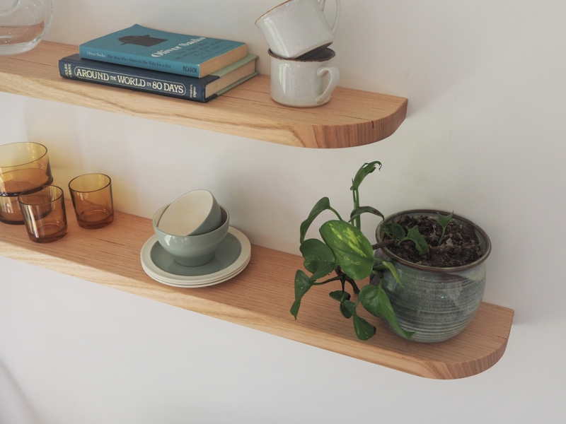 Floating Curved Hardwood Wall Shelves with Decor