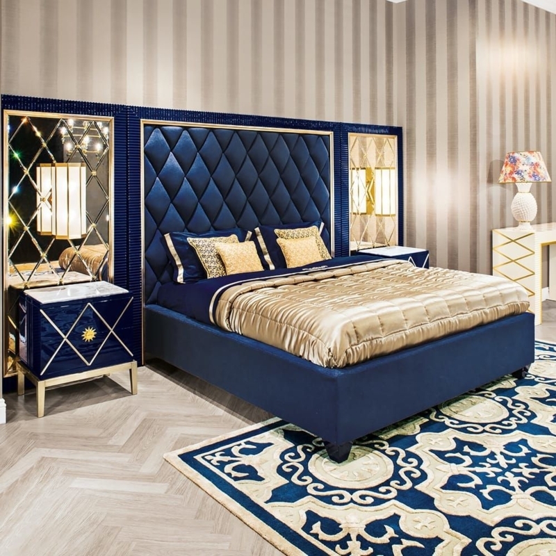 Luxury Blue Velvet Ottoman Storage Bed with Mirrored Accents