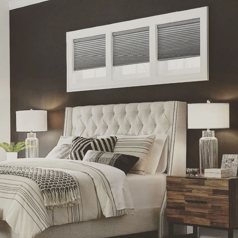 Modern Bedroom with Transom Windows and Neutral Decor