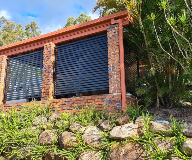 Modern Brick Carport with Horizontal Screen Panels