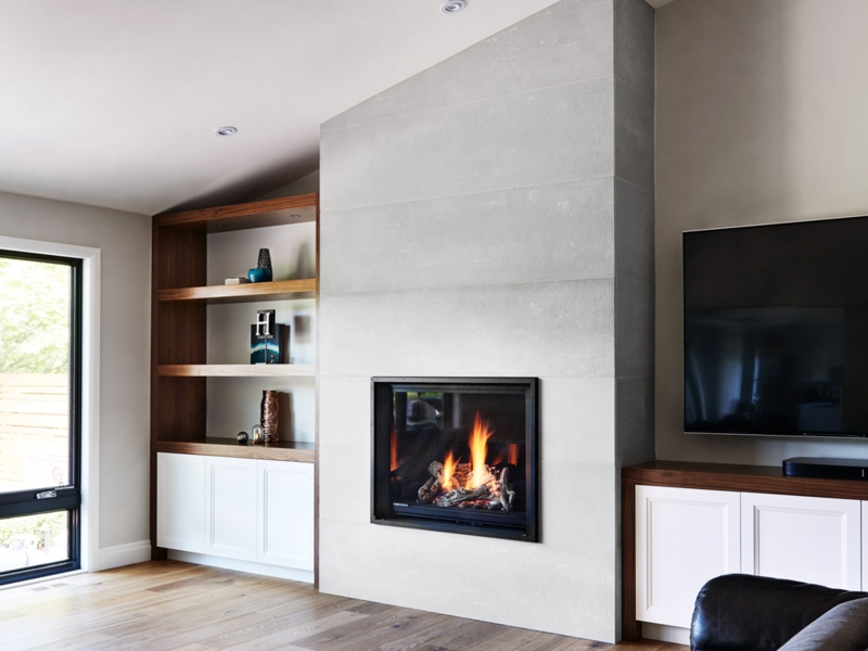 Modern Concrete Fireplace Surround with Built-in Shelves