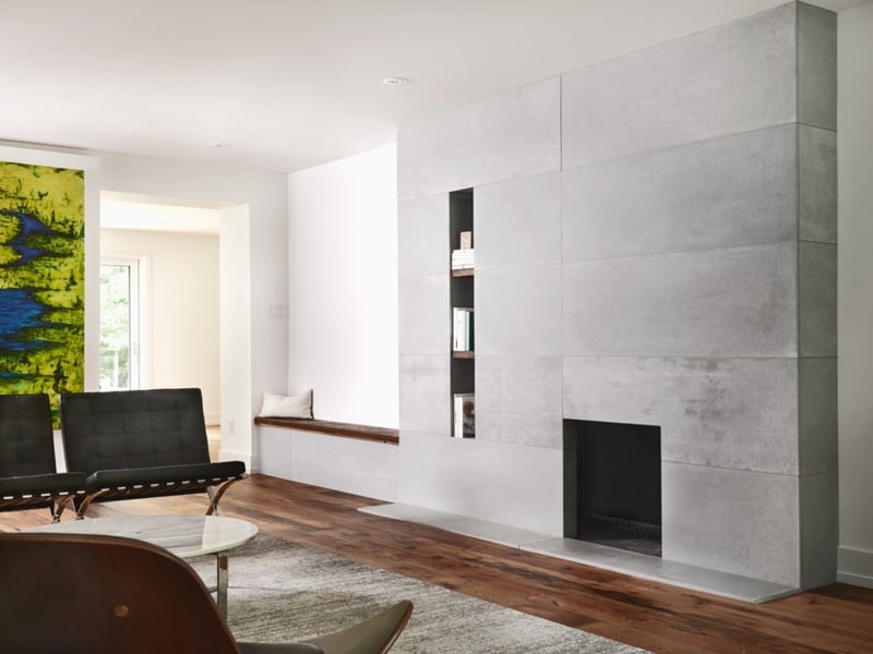 Modern Concrete Fireplace Wall with Built-in Shelves