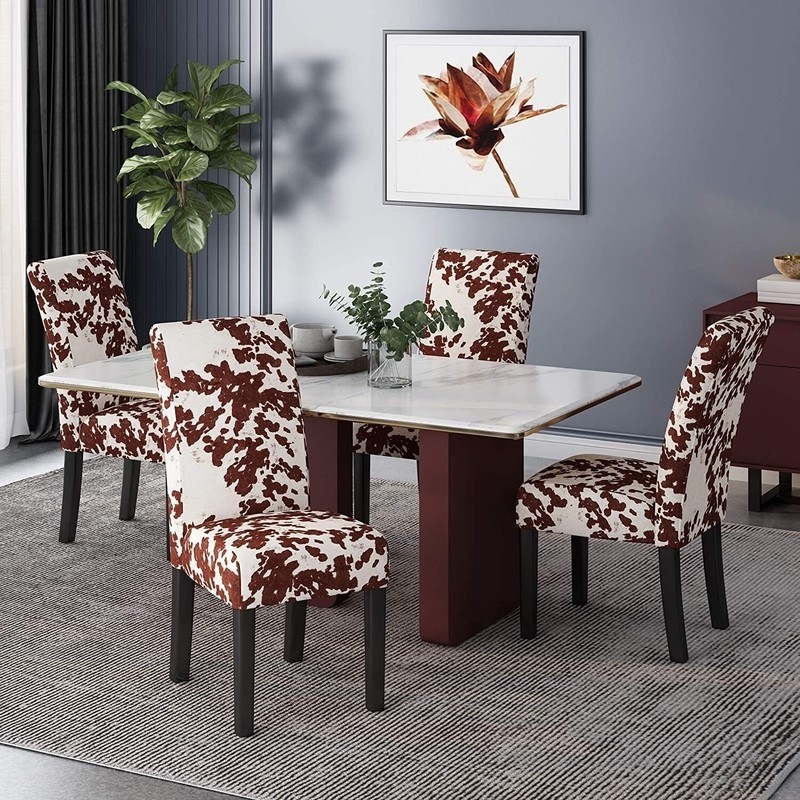 Modern Dining Room with Cowhide Print Chairs