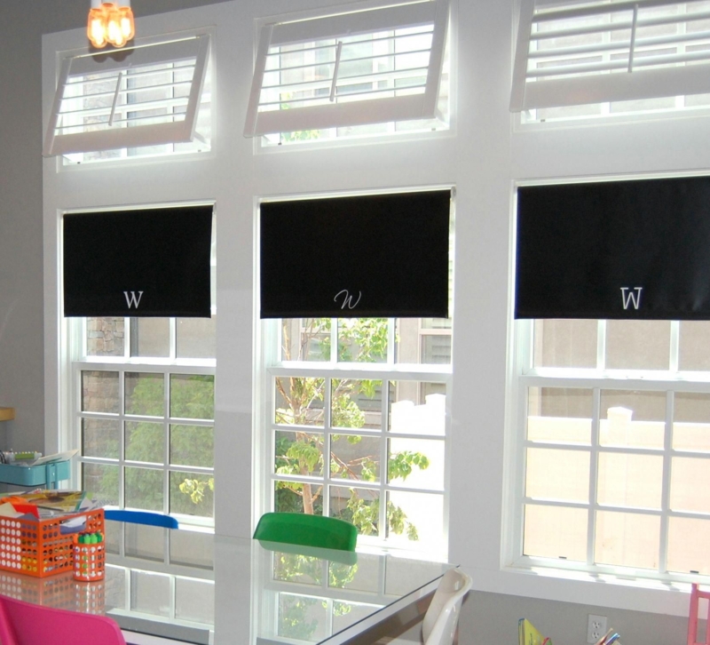 Modern Dining Room with Transom Windows and Black Shades