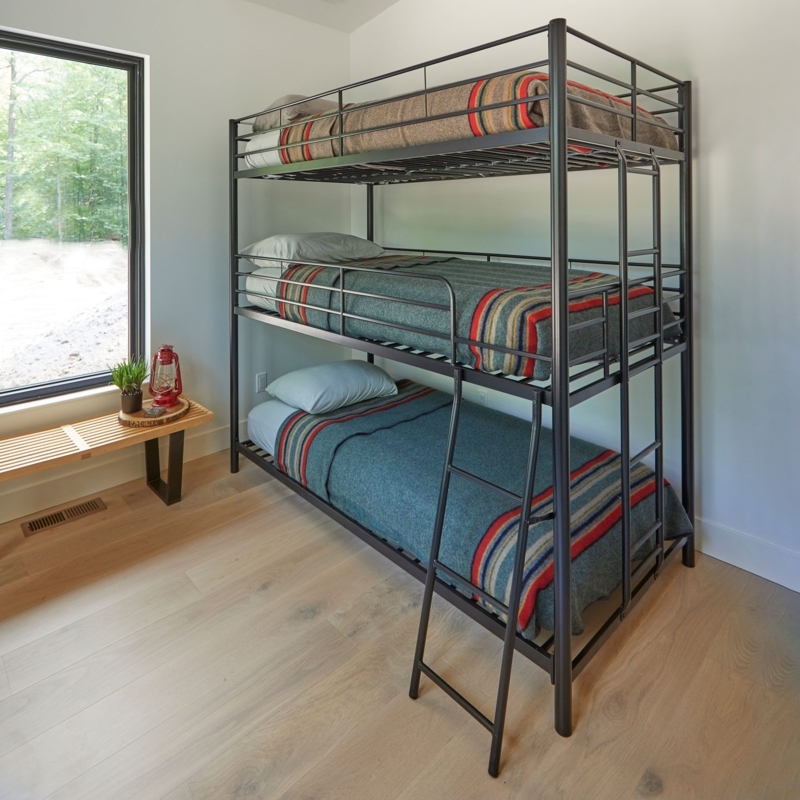 Modern Metal Cabin Bunk Bed with Cozy Bedding