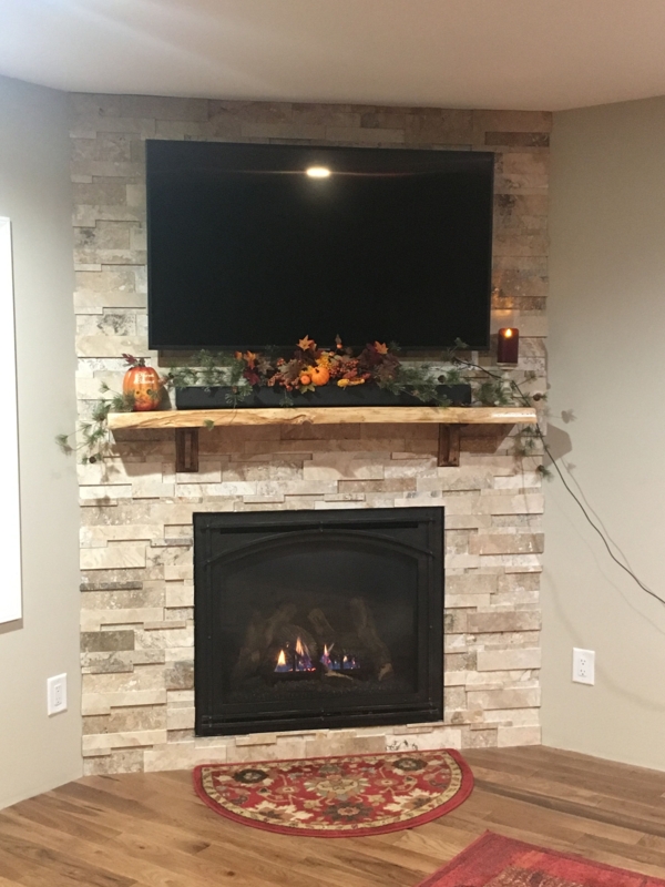 Modern Natural Stone Fireplace with Mounted TV