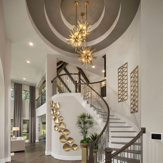 Modern Spiral Staircase with Artistic Pendant Lights