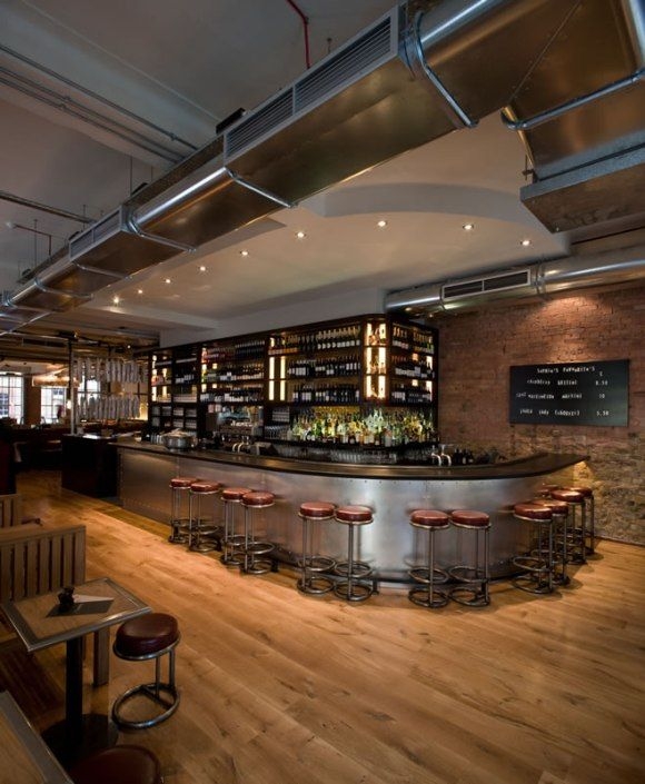 Modern Stainless Steel Curved Bar with Industrial Chic