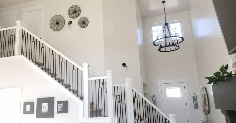 Modern Stairway with Stylish Black Wall Sconces